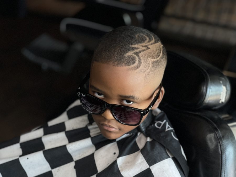 Shaun Fade with clients at the shop