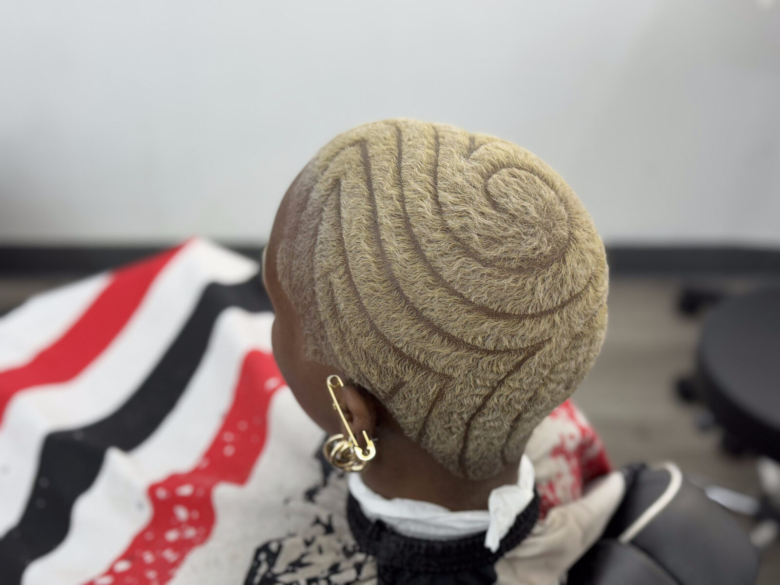 Freehand wave pattern cut into short hair
